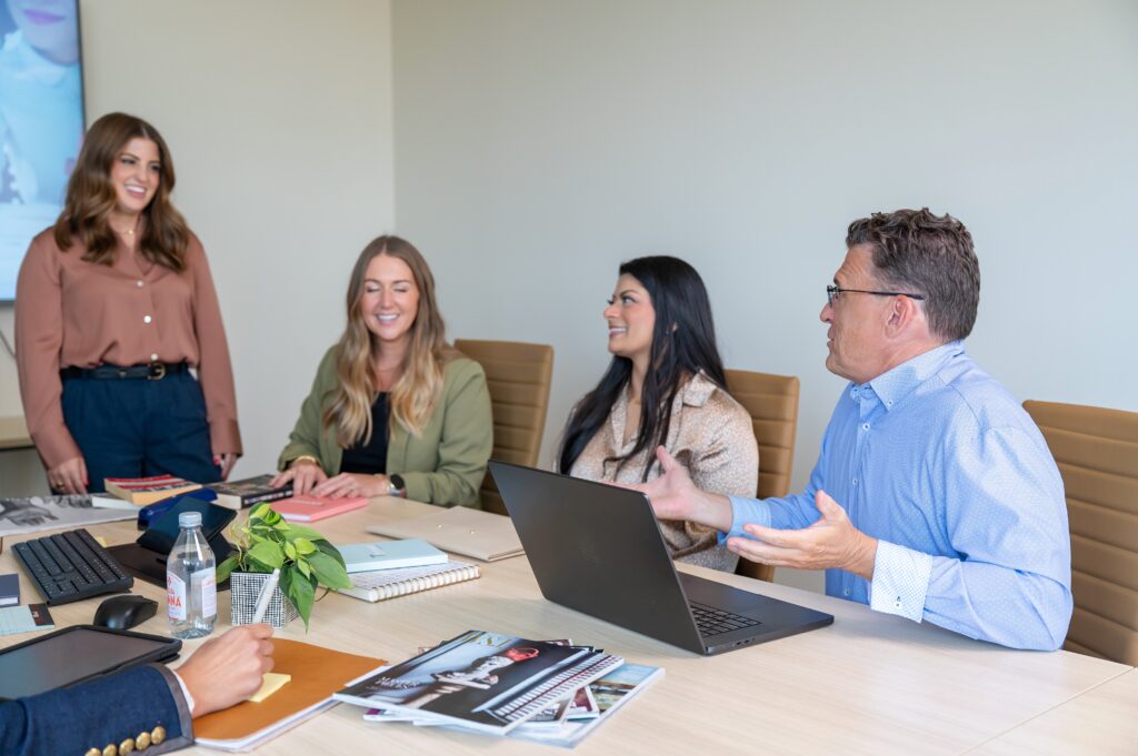 Thread Advisory Group consultants collaborating in a strategy session focused on organizational transformation, leadership alignment, and building high-performing retail teams.